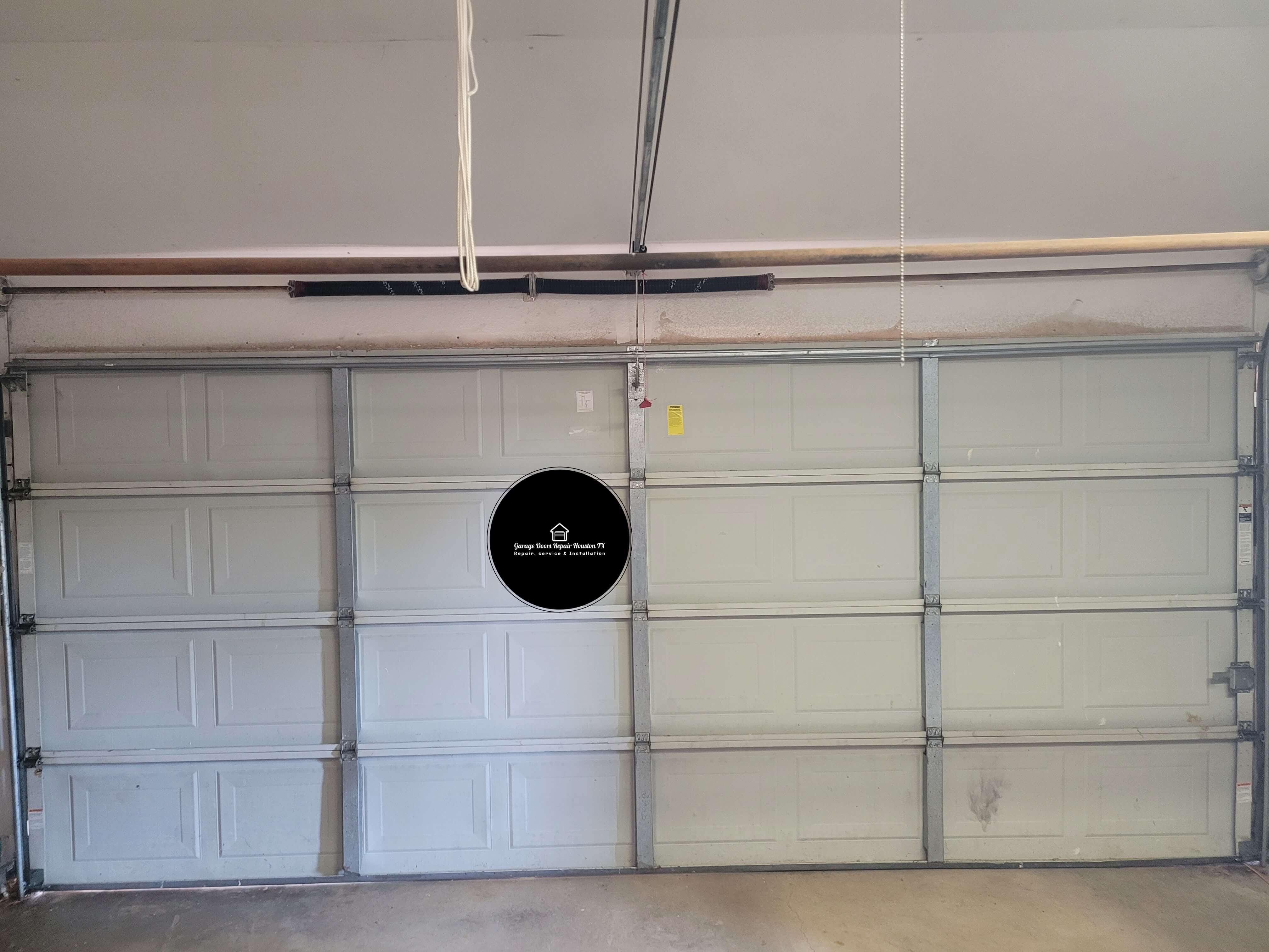 garage-door-torsion-spring-replacement